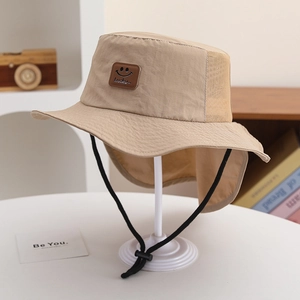 Detail of khaki kids sun hat with breathable mesh vents and protective neck flap cover
