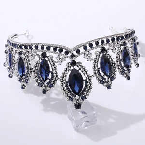 Detailed macro of silver bridal crown featuring navy blue marquise crystals and rhinestones