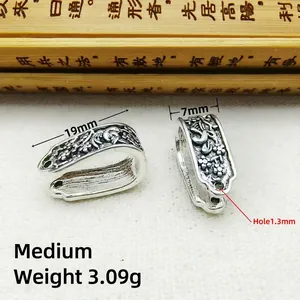 Macro view of medium size silver retro carved floral pendant buckle with detailed dimensions