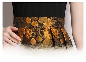 Detailed view of high-waist jacquard dress with floral patterns and gold texture
