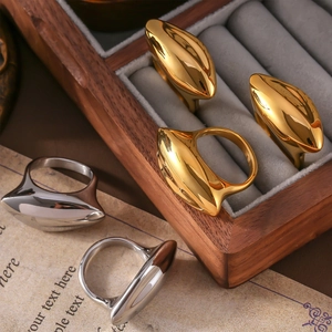 Minimalist geometric titanium steel rings in gold and silver finish with polished surface