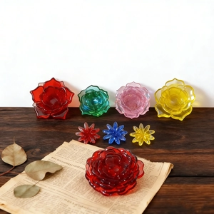Colorful resin flower pendants on a vintage wood desk for DIY jewelry making and decor