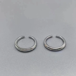 Minimalist S925 sterling silver open toe ring with synthetic opal inlay on gray background