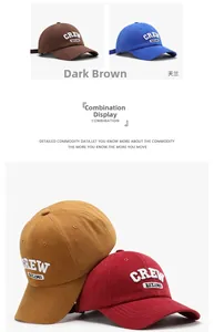 Detail of baseball caps with CREW EST.1983 3D embroidery in four various colors