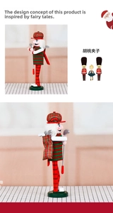 Detail of wooden golf nutcracker showing golf clubs and red plaid fabric texture