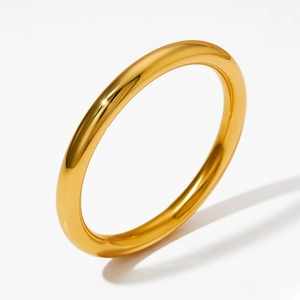 Minimalist polished gold hollow bangle made of high-gloss stainless steel for women