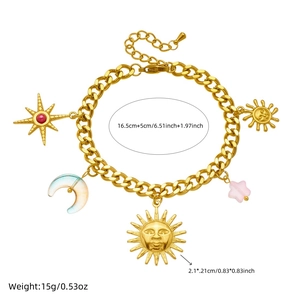 Gold celestial charm bracelet featuring sun moon and star pendants with size dimensions
