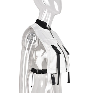 Detail of white utility vest with black buckle straps and zipper on transparent model