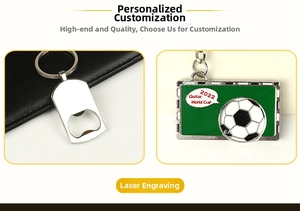 Close-up of a stainless steel bottle opener keychain and a Qatar World Cup football charm