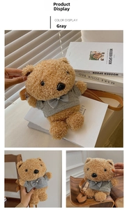 Close-up of cute plush bear crossbody bag with gray hoodie and yellow strap detail