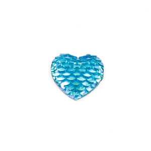 Macro shot of 16mm heart-shaped resin cabochon with mermaid scale texture in blue AB