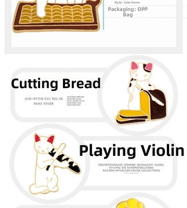 Detail of cat enamel pins featuring a cat slicing bread and playing violin designs