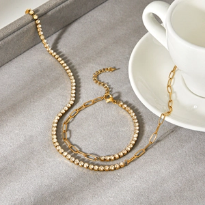 Elegant gold-plated tennis necklace and paperclip chain bracelet set with zircon stones