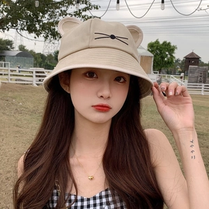 Beige cotton bucket hat with cute cat ears and whiskered embroidery for summer sun protection
