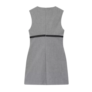 Back view of minimalist grey sleeveless mini dress with black waist band and hidden zipper
