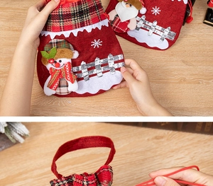 Detail of Christmas snowman drawstring gift bag with sturdy red handle and festive texture