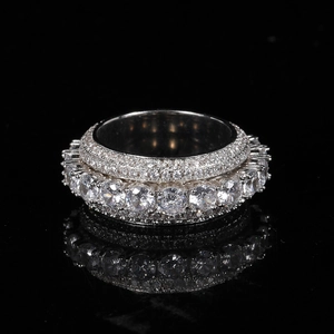 Detailed macro view of silver spinner ring with five rows of pavé-set sparkling zircons