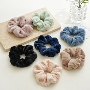 Soft faux fur scrunchie set in multiple colors for elegant autumn winter hairstyles