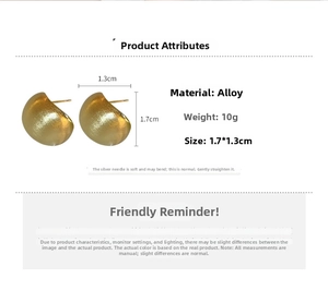 Detail view of gold matte C-shaped earrings with alloy material and 925 silver needles
