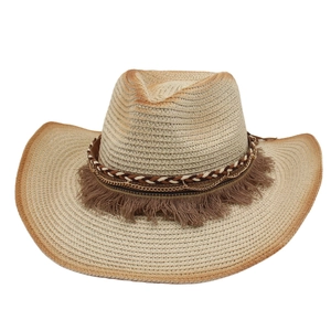 Western straw cowboy hat with bohemian fringe and gold chain detail on white background