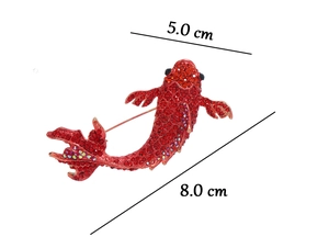 Close-up of red rhinestone koi fish brooch with 5.0cm by 8.0cm dimensions