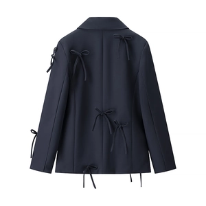 Elegant navy blue blazer with decorative bows on the back and sleeves for women