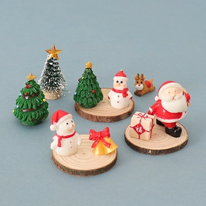 Miniature Christmas resin figurine set with Santa Claus and Reindeer on wooden bases