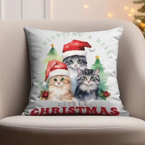 Christmas cat pillow cover on armchair with Meow You a Merry Little Christmas text
