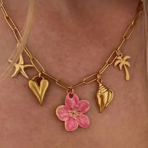 Gold stainless steel necklace with pink enamel flower, starfish, and palm tree charms