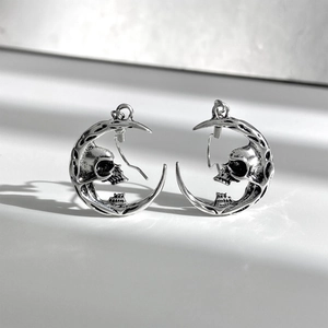 Gothic silver crescent moon earrings with skull and butterfly in vintage metal finish