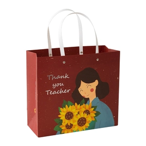 Red Teacher Appreciation gift bag with sunflower illustration and ribbon handle