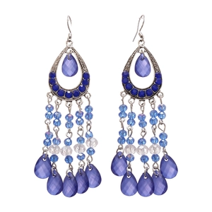 Bohemian silver drop earrings with blue crystal fringe and rhinestone studs on white background