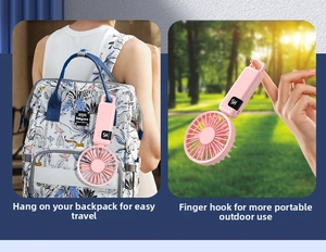Pink portable fan with LED power display hanging on a backpack for outdoor travel