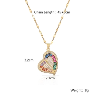 Gold plated heart pendant necklace with rainbow baguette crystals and zircon accents