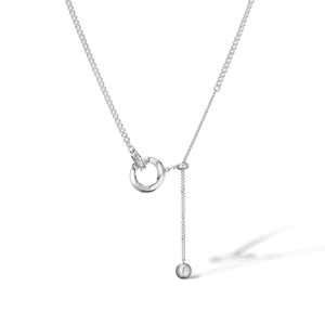 Detail of silver double-loop necklace with sparkling zircons and a small bead pendant