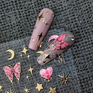 3D gold nail stickers with pink butterfly, stars and moon patterns for manicure art