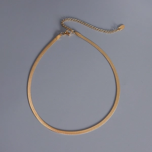 Flat gold snake bone chain necklace in stainless steel with lobster clasp and extension