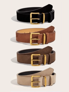 Detail of vintage suede waist belts in four colors with polished gold rectangular buckles