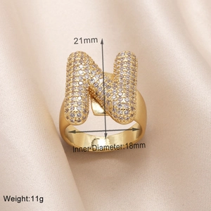 Detailed view of gold-plated letter N ring with zircons showing 21mm height and 11g weight