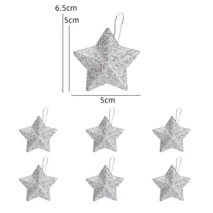 Detailed view of six silver glitter star ornaments for Christmas tree decoration