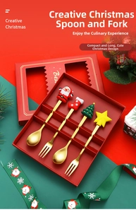 Detailed view of four golden Christmas-themed dessert spoons and forks in a red gift box