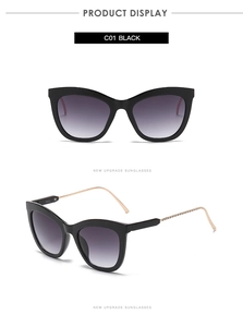 Detailed view of cat eye sunglasses with rose gold metal temples and gradient lenses
