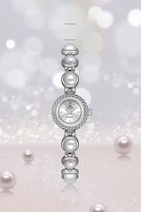 Close-up of elegant silver pearl watch with quartz movement and sparkling rhinestone bezel