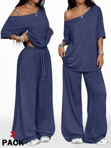 Detail of a 2-pack off-shoulder loungewear set with wide-leg trousers in blue