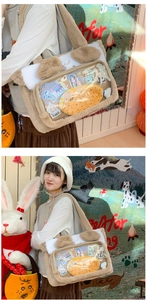 Detail view of plush cat ear shoulder bag with clear PVC display window for accessories
