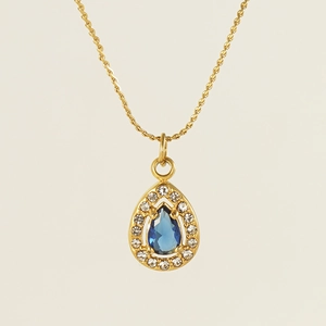 Elegant 18K gold teardrop pendant necklace with a blue gemstone and zircon halo