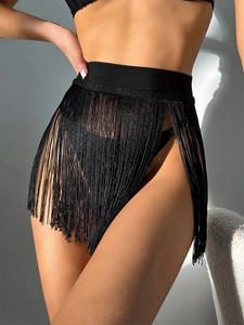 Detail of high waisted black fringe beach cover up skirt with silky fringe tassels