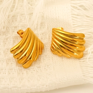 Boucles d'oreilles élégantes en plumes dorées en acier inoxydable poli pour femme