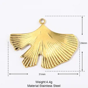 Detailed view of golden ginkgo leaf stainless steel pendant with 31mm x 24mm measurements