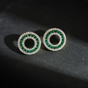 Golden geometric circle earrings with emerald green and white zircon pavé stones